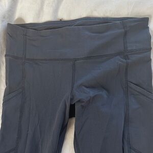 Lululemon fast&free with ruched detail on calf. Back zip & side leg pockets.